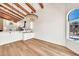 Open kitchen with stainless steel appliances, and stylish chandelier at 4601 E Carolina Dr, Phoenix, AZ 85032