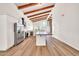 Modern kitchen with wood island countertop, stainless steel appliances, and ample natural light at 4601 E Carolina Dr, Phoenix, AZ 85032
