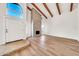 Elegant living space featuring tall ceilings, and a modern fireplace at 4601 E Carolina Dr, Phoenix, AZ 85032