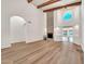 Bright living room with vaulted ceilings, fireplace, and view of outdoor pool at 4601 E Carolina Dr, Phoenix, AZ 85032