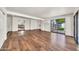 Spacious living room featuring sleek hardwood floors and plenty of natural light with outdoor access at 4601 E Carolina Dr, Phoenix, AZ 85032