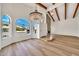 Elegant living room features arched windows and stylish lighting at 4601 E Carolina Dr, Phoenix, AZ 85032