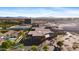 Aerial view of Dillard's and Scottsdale Fashion Square Mall with mountains in the distance at 4610 N 68 N St # 476, Scottsdale, AZ 85251