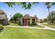 Exterior of a quaint community building featuring lush green landscaping at 4610 N 68 N St # 476, Scottsdale, AZ 85251