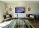 Cozy living room with large TV, modern shelving, and stylish decor at 4610 N 68 N St # 476, Scottsdale, AZ 85251