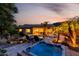 Luxurious backyard featuring a sparkling pool, relaxing spa, and elegant patio perfect for entertaining at 4618 W Pokeberry Ln, Phoenix, AZ 85083