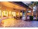 Covered patio with ceiling fans, outdoor seating, tile flooring, and views of the backyard at 4618 W Pokeberry Ln, Phoenix, AZ 85083