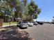 Ample parking available at this property with mature trees providing shade at 5035 N 10Th Pl # 109, Phoenix, AZ 85014