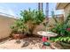 Cozy backyard patio with brick flooring, green foliage, and shade at 509 N Hobson Plz, Mesa, AZ 85203