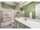 Bathroom features a tub/shower combo and vanity with a single sink at 509 N Hobson Plz, Mesa, AZ 85203