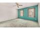 Simple yet functional bedroom with neutral walls, carpet flooring, and natural light through windows at 509 N Hobson Plz, Mesa, AZ 85203