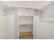 Open closet with shelving and hanging rods for efficient storage solutions at 509 N Hobson Plz, Mesa, AZ 85203