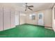 Enclosed living room offers natural light, ample storage, and dual access doors at 509 N Hobson Plz, Mesa, AZ 85203