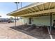 View of covered parking area with assigned parking spots and secure access at 509 N Hobson Plz, Mesa, AZ 85203