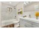 Contemporary bathroom featuring a tiled shower, modern vanity, and stylish mirror at 556 S Forest --, Mesa, AZ 85204