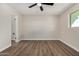 Bedroom featuring hardwood floors and a ceiling fan at 556 S Forest --, Mesa, AZ 85204
