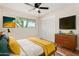 Bright bedroom features a comfortable bed, fresh paint, and ample storage space at 556 S Forest --, Mesa, AZ 85204