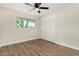 Bedroom featuring hardwood floors and a ceiling fan at 556 S Forest --, Mesa, AZ 85204