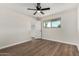 Bedroom featuring hardwood floors and a ceiling fan at 556 S Forest --, Mesa, AZ 85204