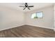 Bedroom featuring hardwood floors and a ceiling fan at 556 S Forest --, Mesa, AZ 85204