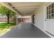 Covered patio with outdoor access to backyard, neutral colors, and shade at 556 S Forest --, Mesa, AZ 85204