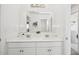 Bright bathroom with dual sinks, modern fixtures and plenty of counter space at 8012 W Griswold Rd, Peoria, AZ 85345