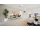 Inviting living room featuring a work space, neutral color palette and carpet at 8012 W Griswold Rd, Peoria, AZ 85345