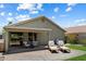 Charming backyard with patio, comfortable seating, and well-maintained lawn, perfect for relaxing at 810 E Potter Dr, Phoenix, AZ 85024