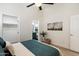 A bedroom showing a walk-in closet and a modern bathroom, providing functionality and style at 810 E Potter Dr, Phoenix, AZ 85024