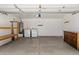 Spacious garage with washer, dryer, and water heater, offering functionality and storage space at 810 E Potter Dr, Phoenix, AZ 85024