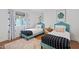 Charming bedroom with two twin beds, stylish decor, natural light, and modern furnishings, creating a cozy and inviting space at 8102 E Cambridge Ave, Scottsdale, AZ 85257