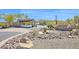 Community entrance featuring desert landscaping and community signage at 8154 E Tecolote Cir, Scottsdale, AZ 85266