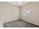 Bright bedroom with neutral walls, carpeting, ceiling fan, and window at 838 W Basswood Ave, Queen Creek, AZ 85140