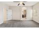 Primary bedroom with adjoining bath at 838 W Basswood Ave, Queen Creek, AZ 85140