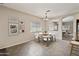 Cozy dining area featuring modern decor and ample natural light at 838 W Basswood Ave, Queen Creek, AZ 85140