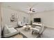 Comfortable living room with stylish furnishings and view of backyard at 838 W Basswood Ave, Queen Creek, AZ 85140