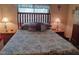 Inviting main bedroom featuring a plush bed, bedside tables, and peaceful decor for relaxation at 8600 E Broadway Rd # 91, Mesa, AZ 85208
