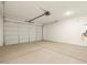 Spacious two car garage with roll up door at 8634 W Albeniz Pl, Tolleson, AZ 85353