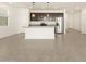 Beautiful kitchen featuring island, stainless steel appliances, and pendant lighting over the island and undermount sink at 8634 W Albeniz Pl, Tolleson, AZ 85353