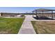 Community park with tables, picnic area, and benches at 8634 W Albeniz Pl, Tolleson, AZ 85353