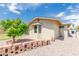 Charming single-story home features a well-maintained front yard with desert landscaping, and a bay window at 903 W Shawnee Dr, Chandler, AZ 85225