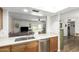 Kitchen sink and countertop showing the living room and sliding glass door at 903 W Shawnee Dr, Chandler, AZ 85225