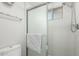 Shower featuring a frosted glass door and shower head with white subway tile at 903 W Shawnee Dr, Chandler, AZ 85225