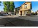 Two story home with a two-car garage and desert landscaping in a residential neighborhood at 9415 W Eaton Rd, Phoenix, AZ 85037