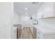 Modern kitchen with sleek countertops, stainless steel appliances, and ample storage at 948 S Alma School Rd # 1, Mesa, AZ 85210