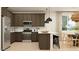 Well-equipped kitchen with stainless steel appliances and barstool seating at 9522 W Avalon Dr, Phoenix, AZ 85037