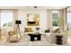 Bright living room with stylish decor, comfortable seating, and abundant natural light at 9522 W Avalon Dr, Phoenix, AZ 85037