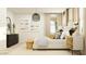 Serene main bedroom featuring neutral tones, stylish furniture, and bright natural light at 9522 W Avalon Dr, Phoenix, AZ 85037