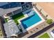 Aerial view of backyard with pool, pergola with outdoor seating and manicured landscaping at 9645 E Ripple Dr, Mesa, AZ 85212