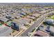 An aerial view of a neighborhood with neat rows of single-Gathering homes and well-maintained streets at 9645 E Ripple Dr, Mesa, AZ 85212